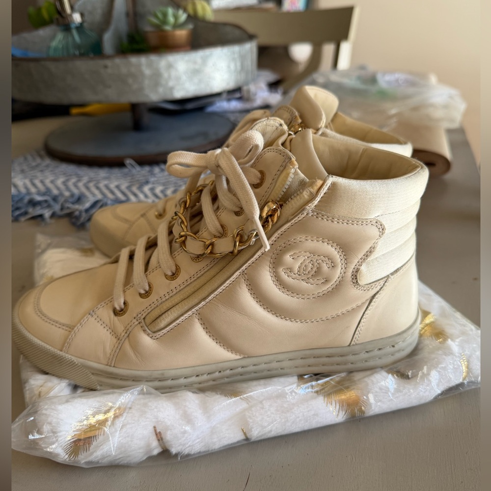 Authentic Chanel Ivory High-Top Sneakers with Gold Chain